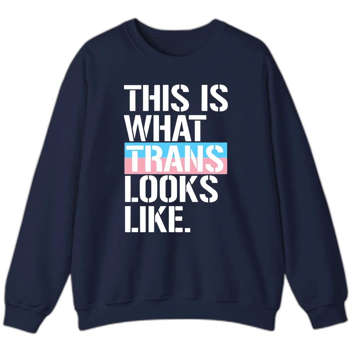 Bold typography design reading 'THIS IS WHAT TRANS LOOKS LIKE' with trans pride flag colors in blue and pink stripe in Navy