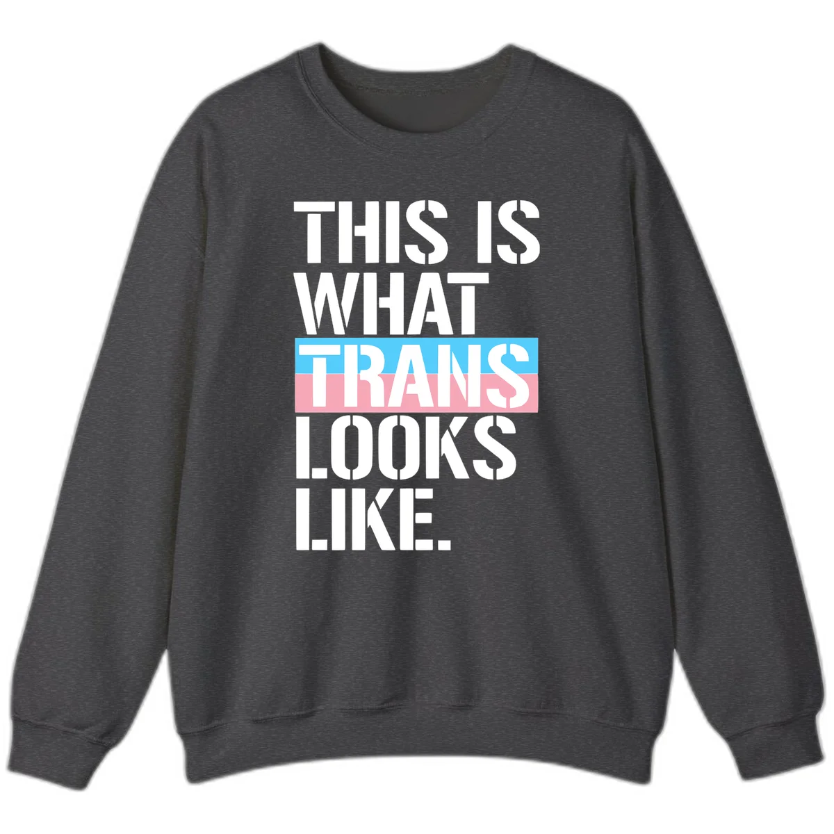 Bold typography design reading 'THIS IS WHAT TRANS LOOKS LIKE' with trans pride flag colors in blue and pink stripe in Dark Heather