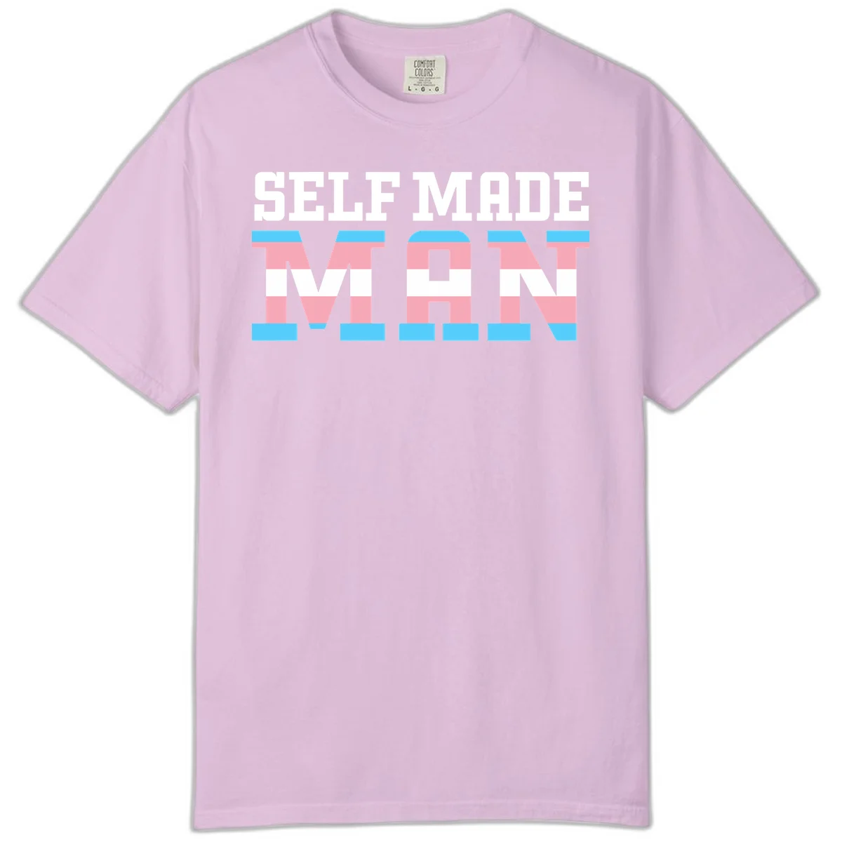 Bold 'Self Made' text filled with transgender pride flag stripes in blue, pink, and white on gray background in Orchid