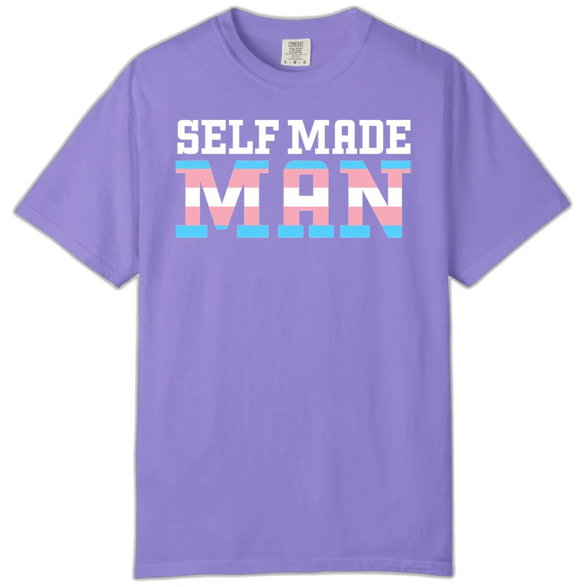 Bold 'Self Made' text filled with transgender pride flag stripes in blue, pink, and white on gray background in Violet
