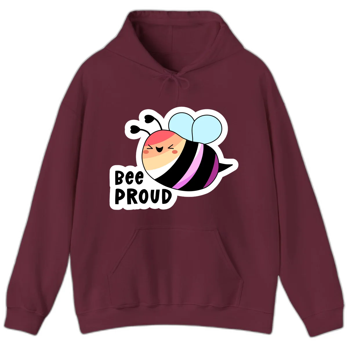 Cheerful cartoon bee with peach face and pink-striped body next to 'Bee Proud' text celebrating pride and individuality in Maroon