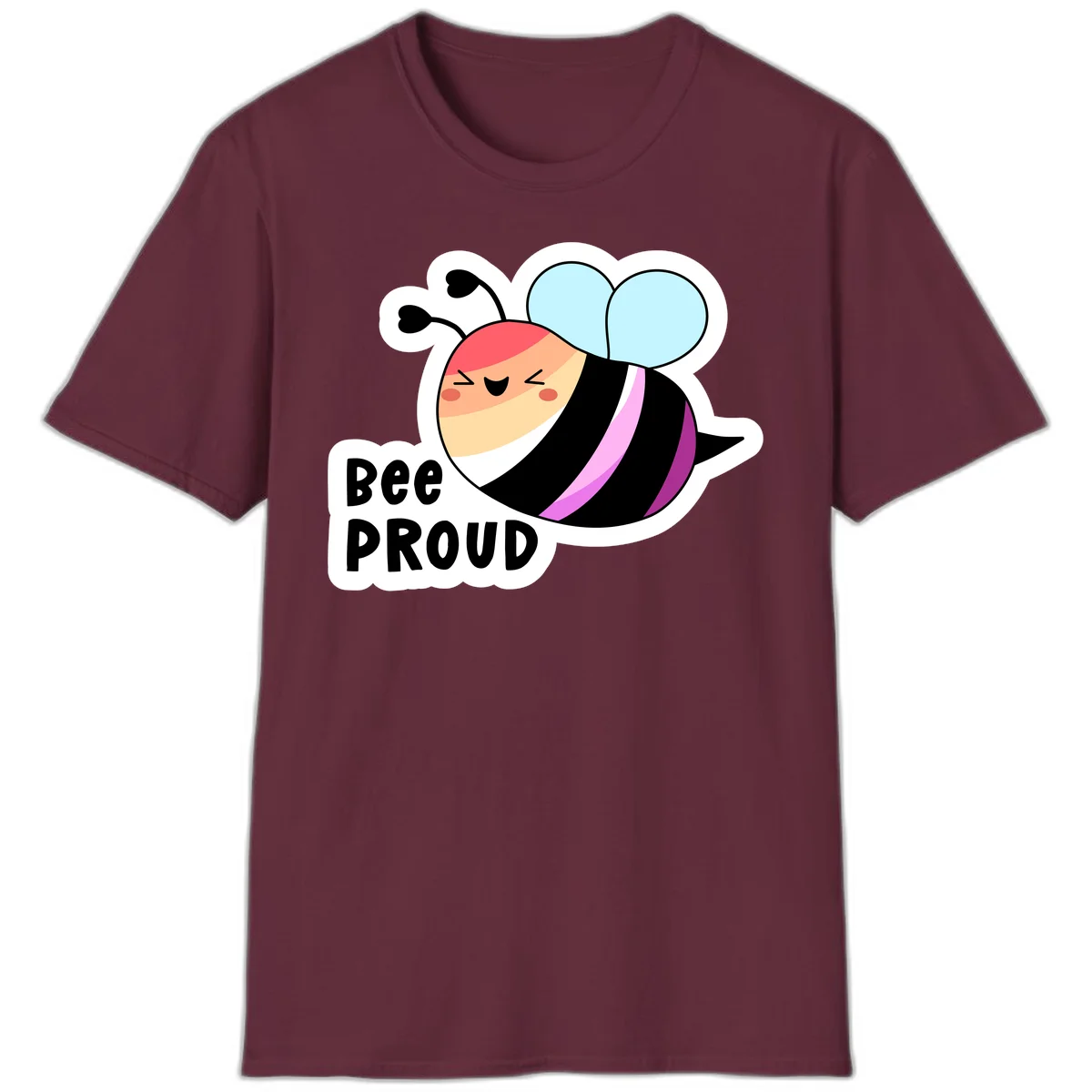 Cheerful cartoon bee with peach face and pink-striped body next to 'Bee Proud' text celebrating pride and individuality in Maroon