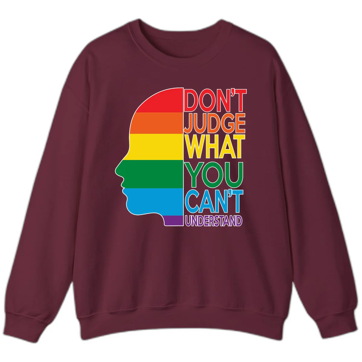 Rainbow-striped head silhouette with text 'Don't Judge What You Can't Understand' promoting LGBTQ acceptance and inclusion in Maroon