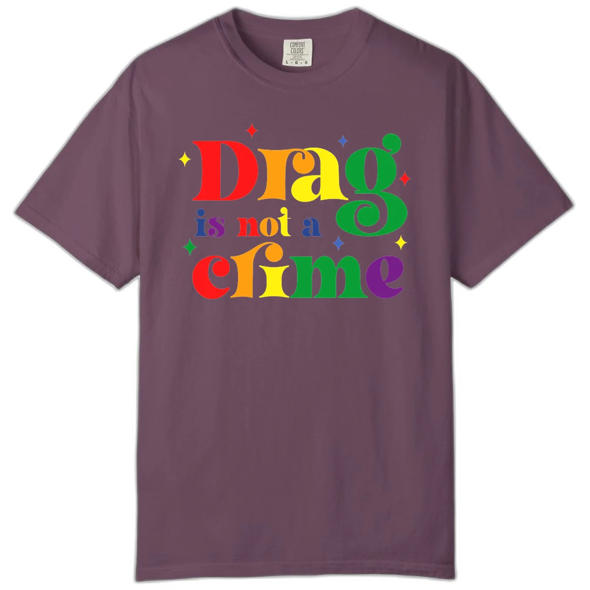 Colorful rainbow typography spelling 'Drag is not a crime' with decorative stars on gray background in Berry