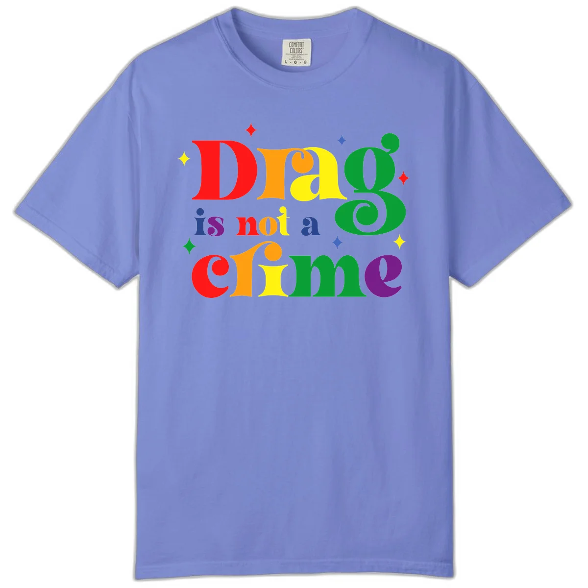 Colorful rainbow typography spelling 'Drag is not a crime' with decorative stars on gray background in Flo Blue