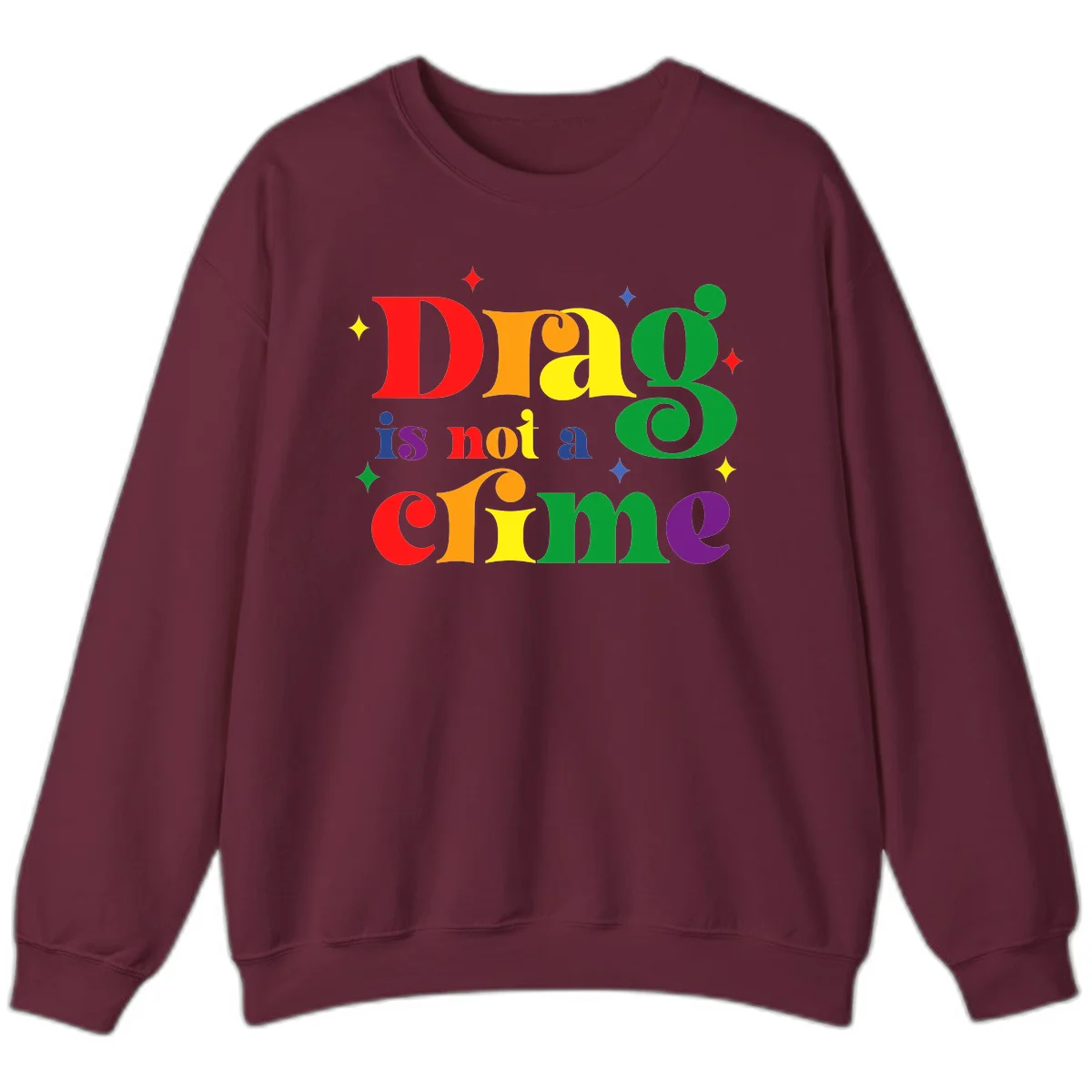 Colorful rainbow typography spelling 'Drag is not a crime' with decorative stars on gray background in Maroon