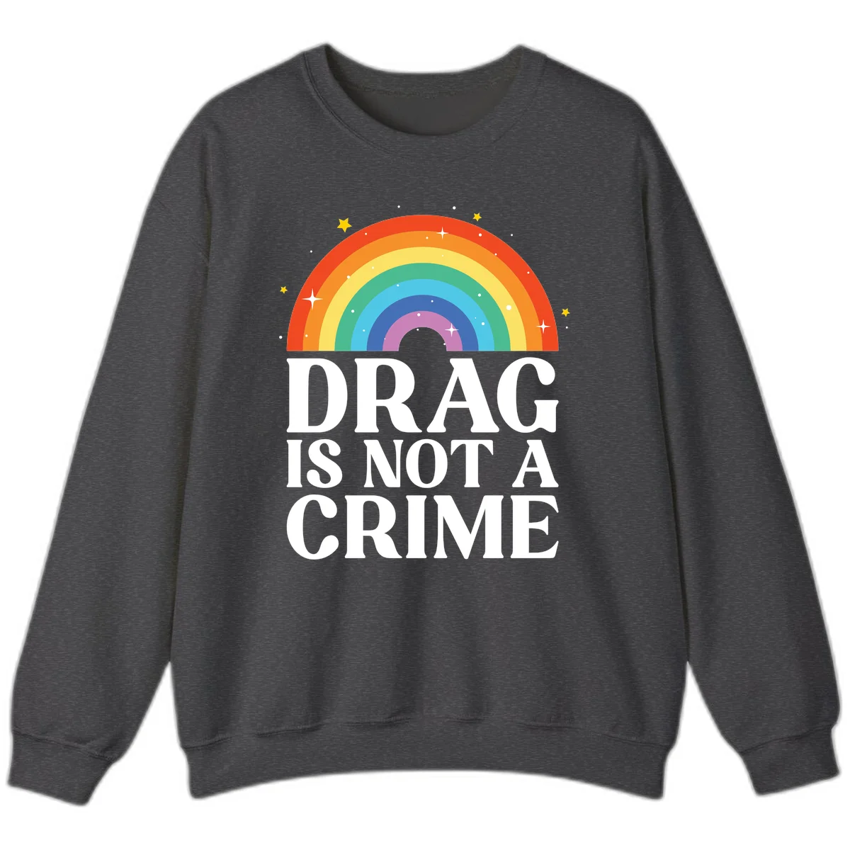 Colorful rainbow arc with stars above white text reading 'Drag Is Not A Crime' on gray background in Dark Heather