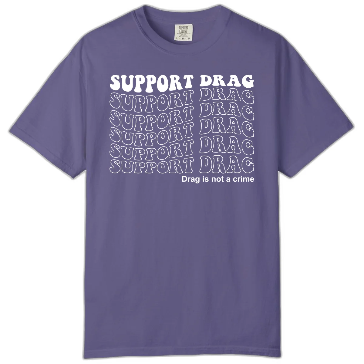 Gray t-shirt design with white text reading 'Support Drag' repeated throughout and 'Drag is not a crime' at bottom in Grape