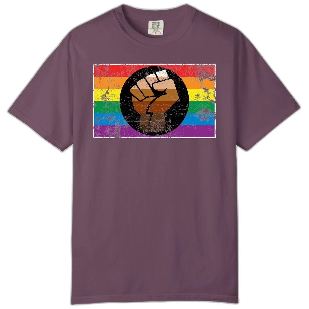 Distressed circular badge featuring a raised brown fist overlaid on a rainbow pride flag background, symbolizing LGBTQ+ solidarity and empowerment in Berry