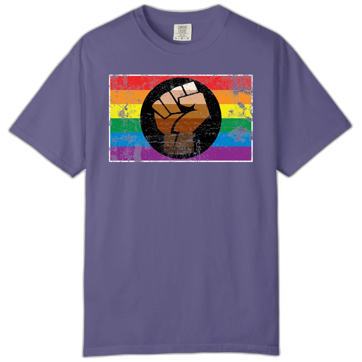 Distressed circular badge featuring a raised brown fist overlaid on a rainbow pride flag background, symbolizing LGBTQ+ solidarity and empowerment in Grape