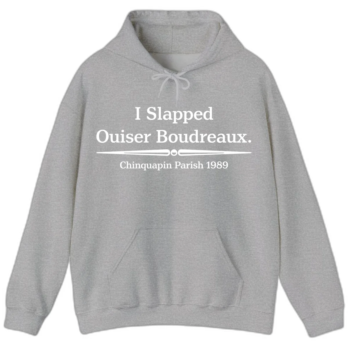 White text on gray background reading 'I Slapped Ouiser Boudreaux. Chinquapin Parish 1989' with decorative line divider in Sport Grey