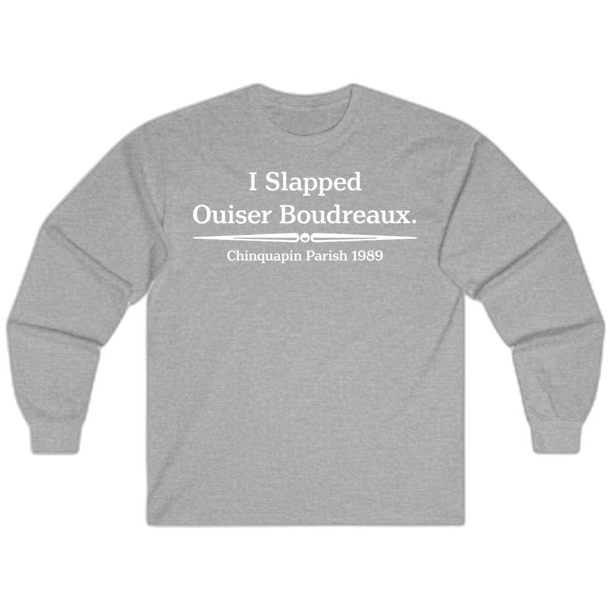 White text on gray background reading 'I Slapped Ouiser Boudreaux. Chinquapin Parish 1989' with decorative line divider in Sport Grey