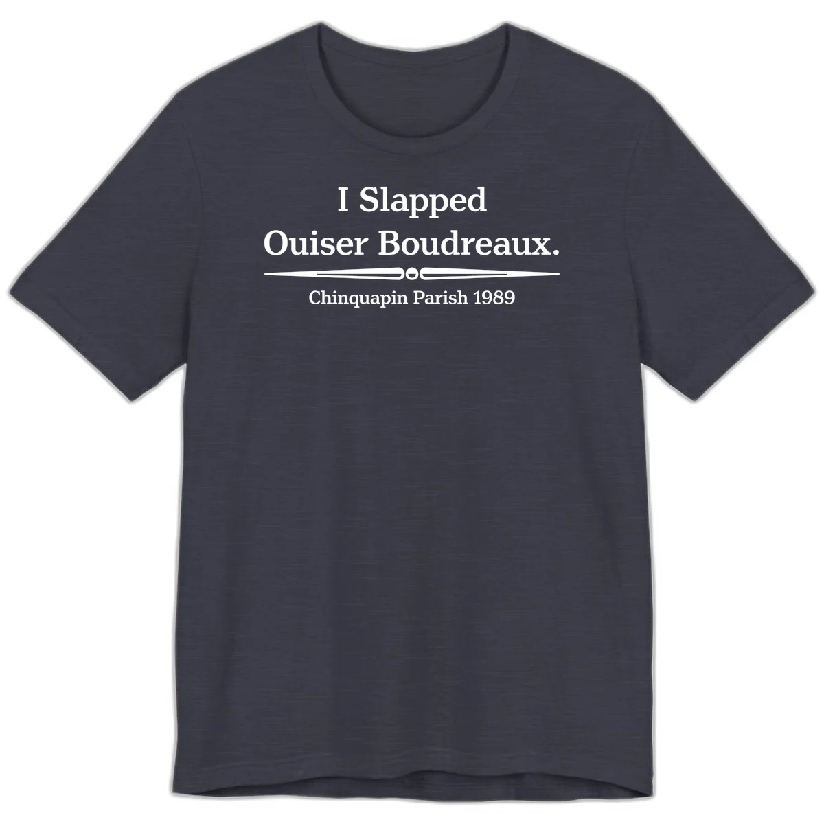 White text on gray background reading 'I Slapped Ouiser Boudreaux. Chinquapin Parish 1989' with decorative line divider in Heather Midnight Navy