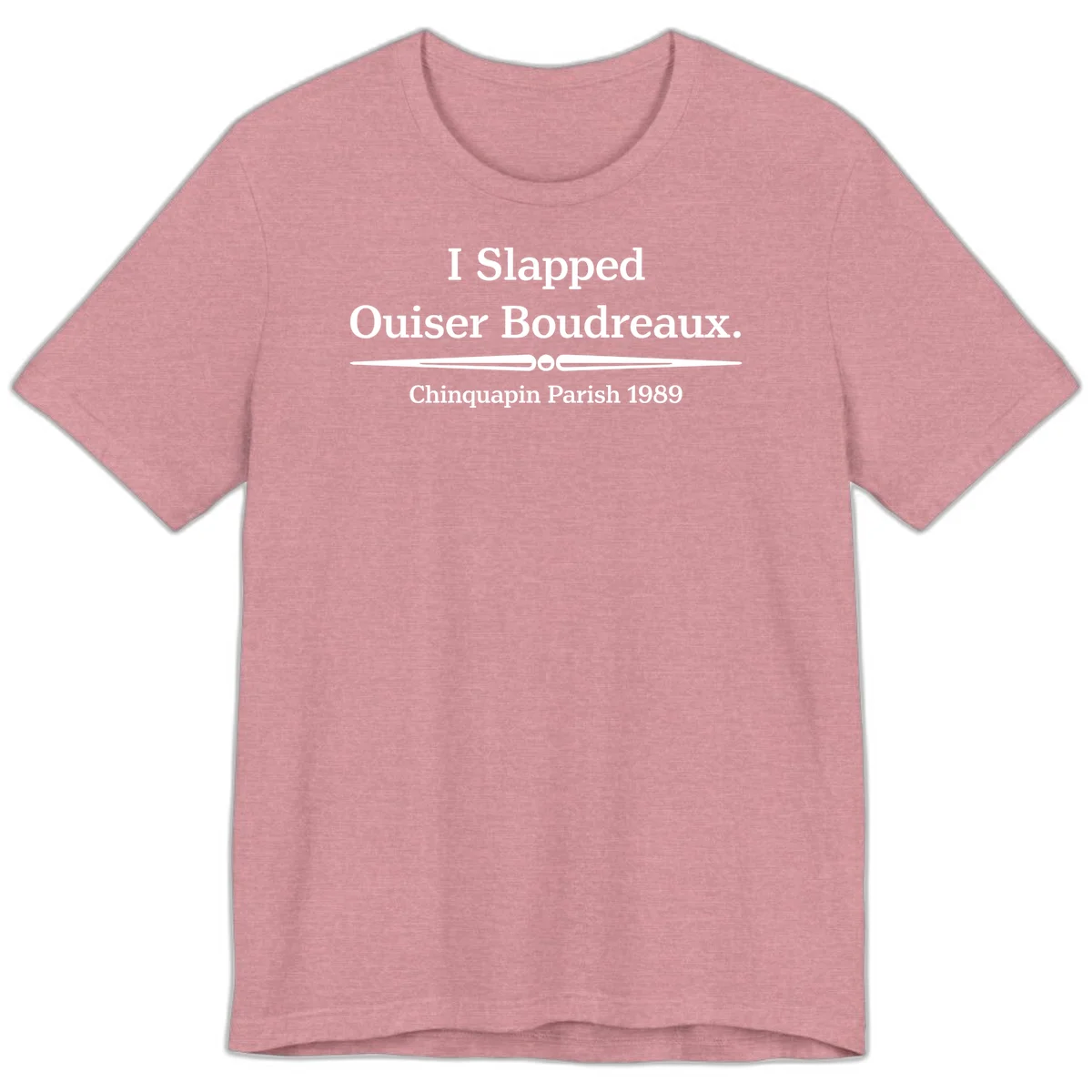 White text on gray background reading 'I Slapped Ouiser Boudreaux. Chinquapin Parish 1989' with decorative line divider in Heather Orchid