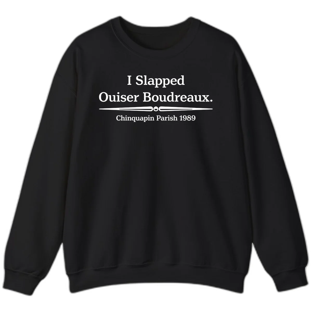 White text on gray background reading 'I Slapped Ouiser Boudreaux. Chinquapin Parish 1989' with decorative line divider in Black