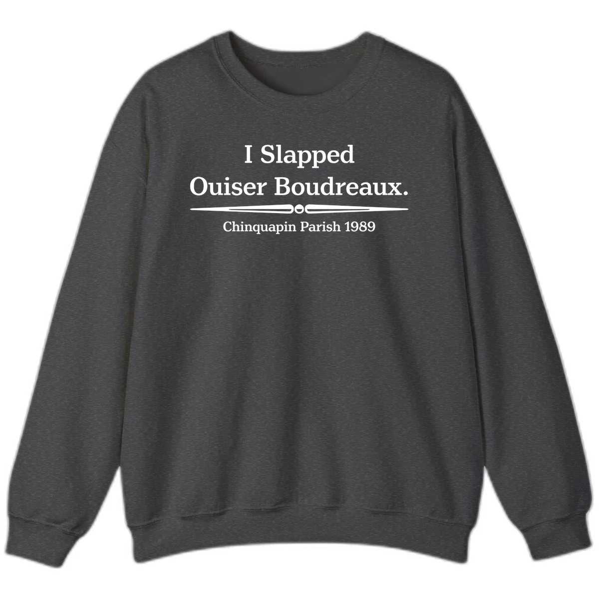 White text on gray background reading 'I Slapped Ouiser Boudreaux. Chinquapin Parish 1989' with decorative line divider in Dark Heather
