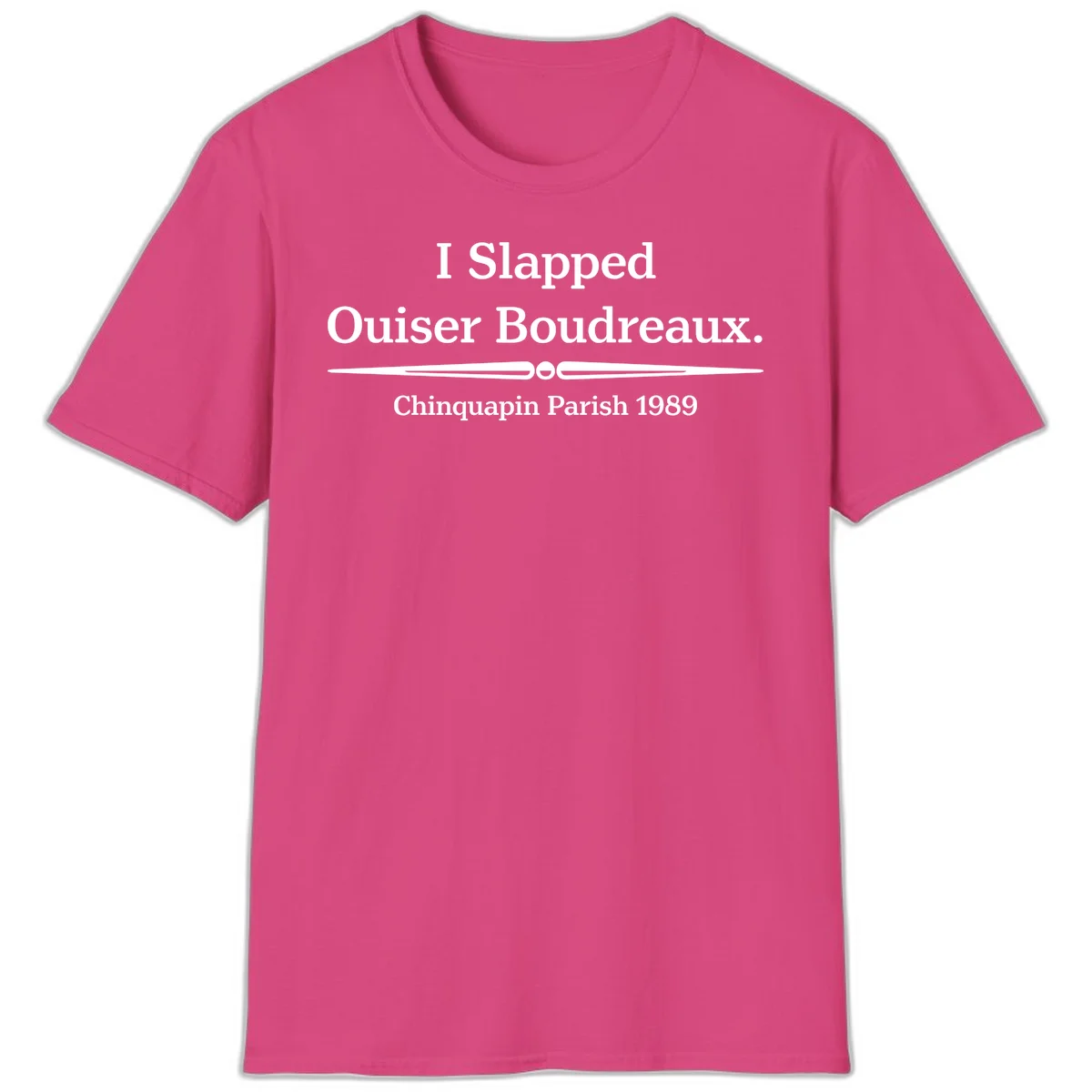 White text on gray background reading 'I Slapped Ouiser Boudreaux. Chinquapin Parish 1989' with decorative line divider in Heliconia